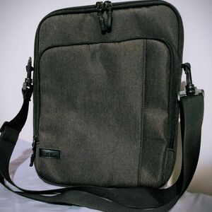 Black Tablet Bag with Adjustable Strap and Minimalist Design